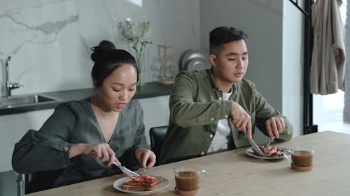 Couple Eating Breakfast