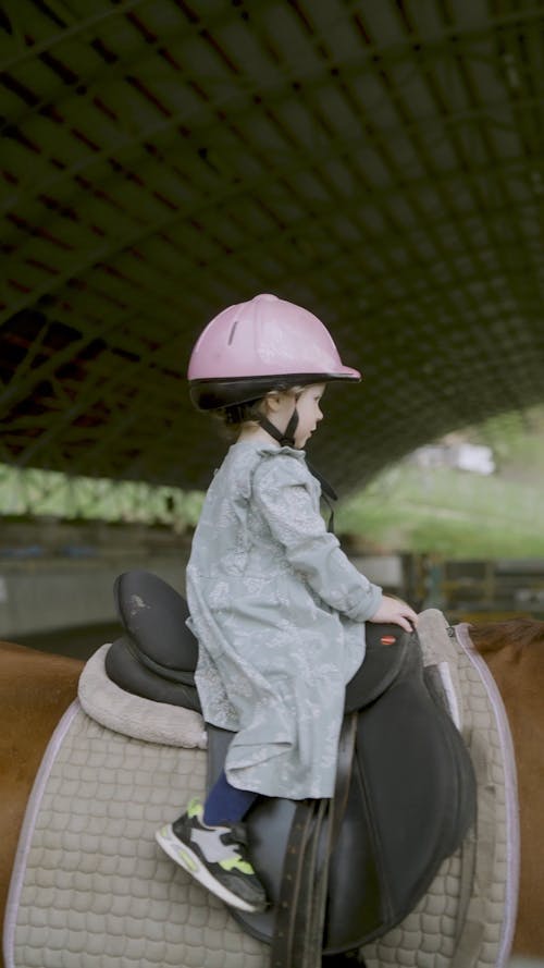 Little Girl Riding A Horse