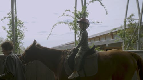 Girl Doing Horseback Riding