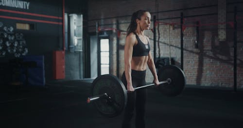 A Woman Lifting Weights