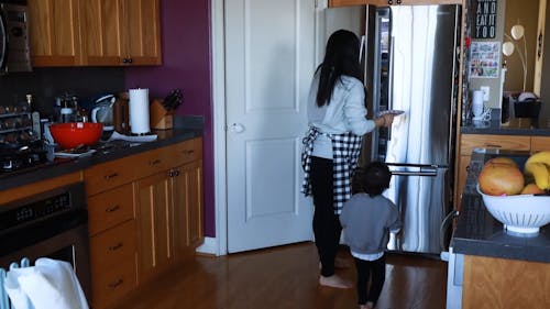 A Mother and Child in a Kitchen