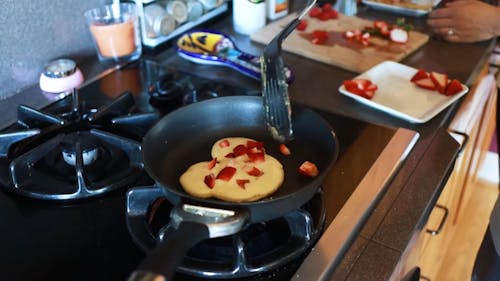 A Person Cooking Pancakes
