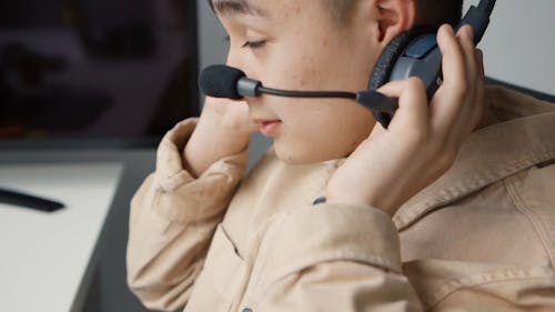 Man Talking while Wearing a Headset