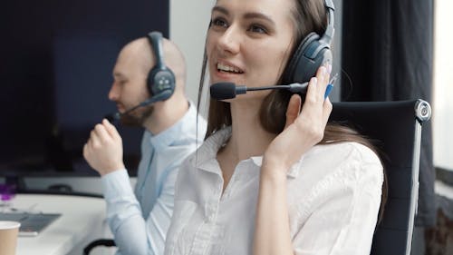 Woman Attending a Call of a Client