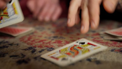 Playing Cards on the Carpet