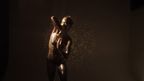 Female Dancer Covered in Glitter