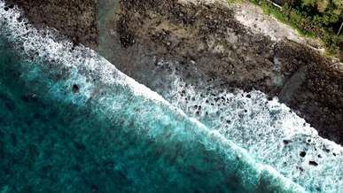 drone footage of a shoreline