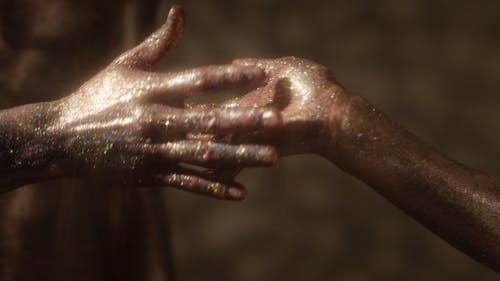 Hands Covered in Glitters