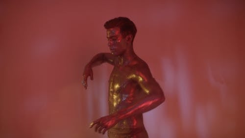 Dancing Man Covered in Glitters
