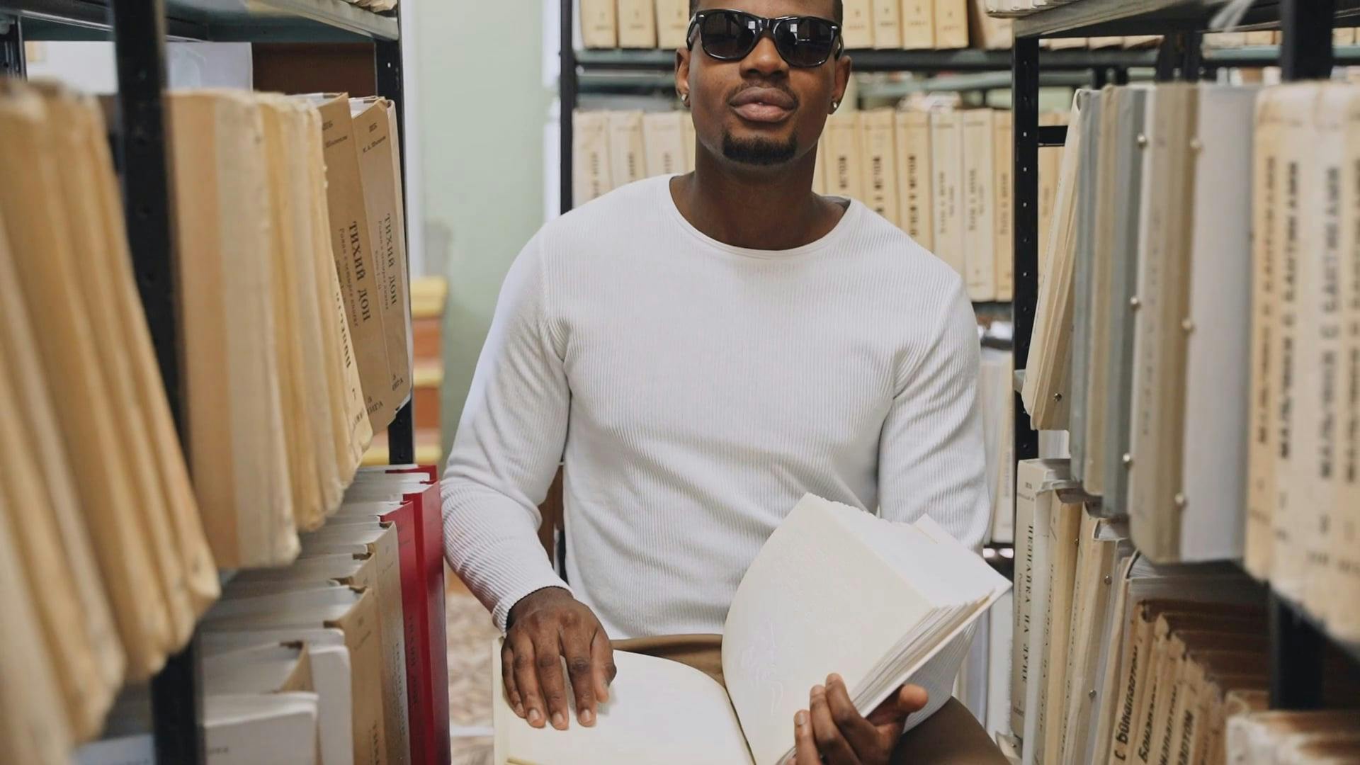 A Man Holding a Braille · Free Stock Video