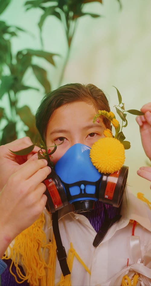 Person in Colorful Costume Wearing Face Mask