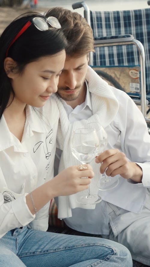 Couple on a Date Holding Wine Glasses