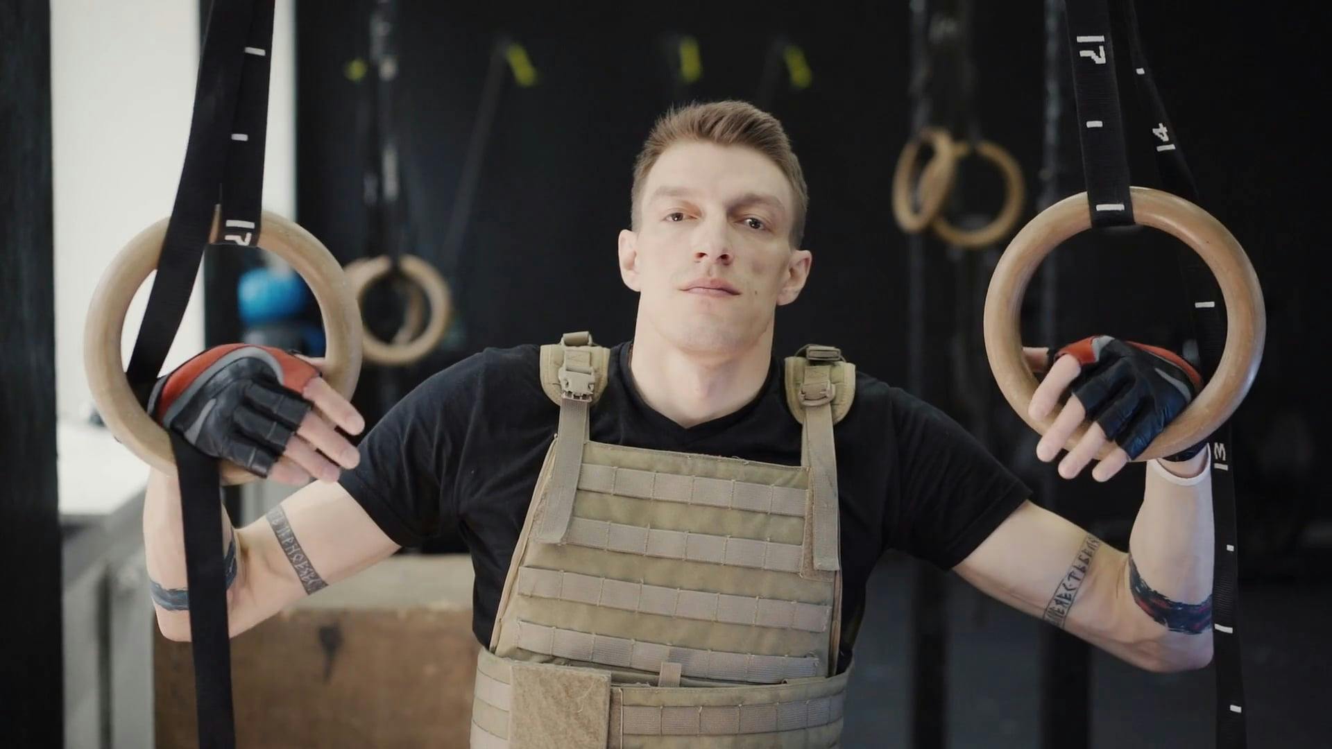 Man Holding Gymnastic Rings Looking at Camera · Free Stock Video