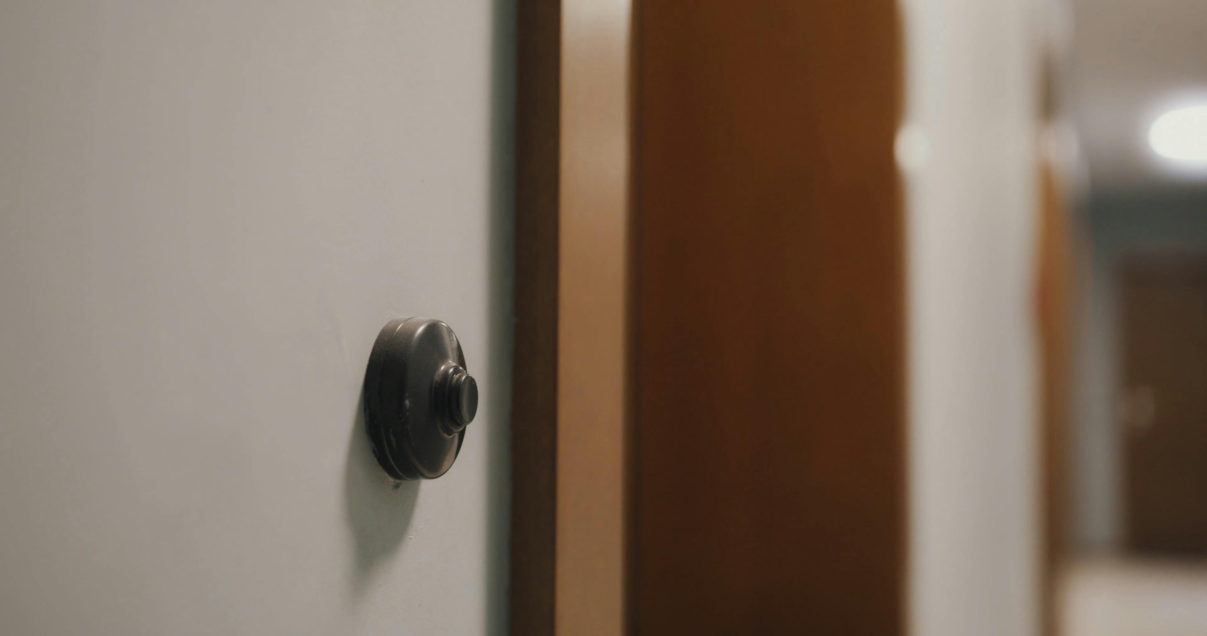 Close-Up Video of a Person Pushing a Doorbell · Free Stock Video