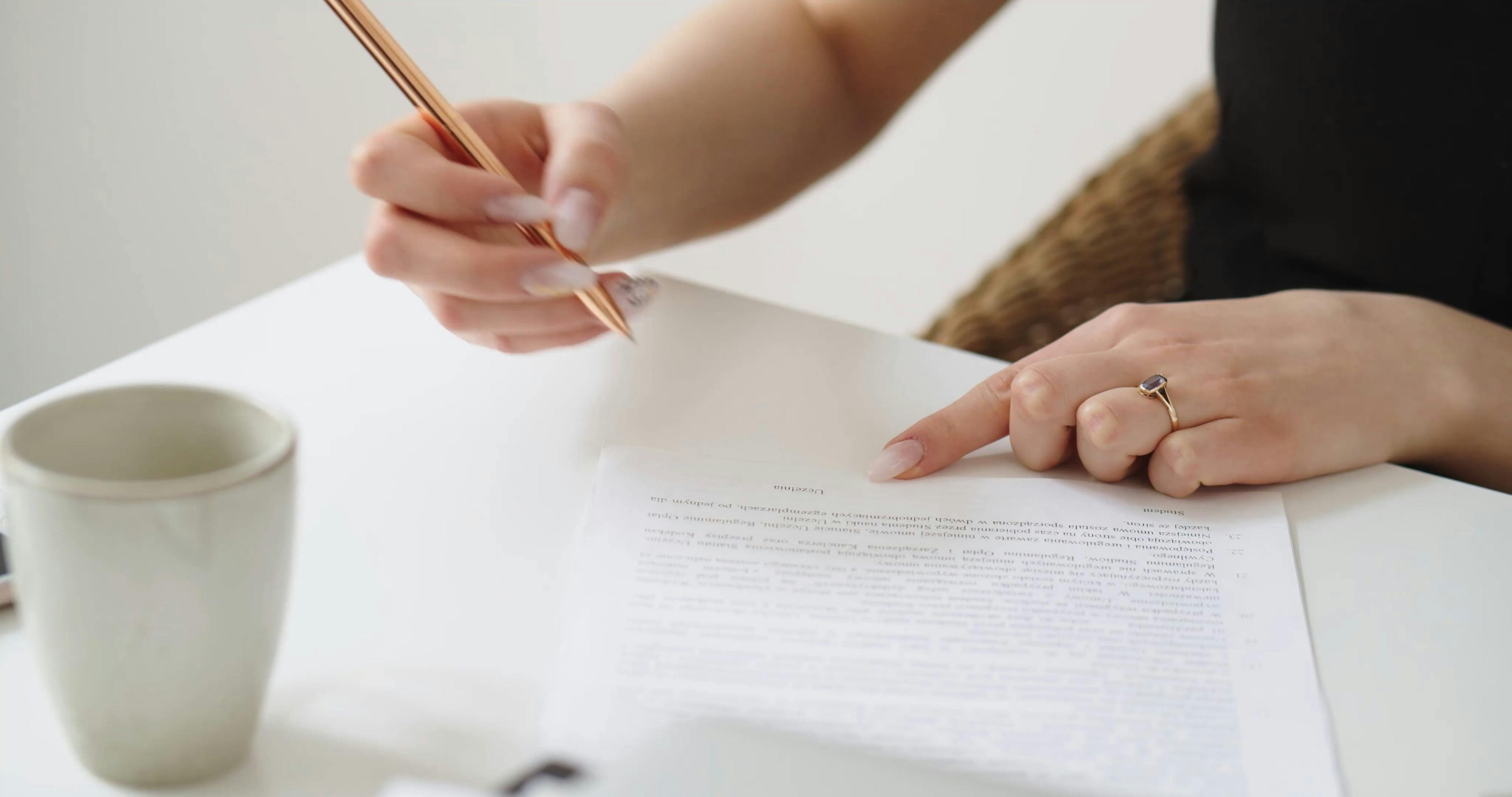 A Woman Signing a Document · Free Stock Video