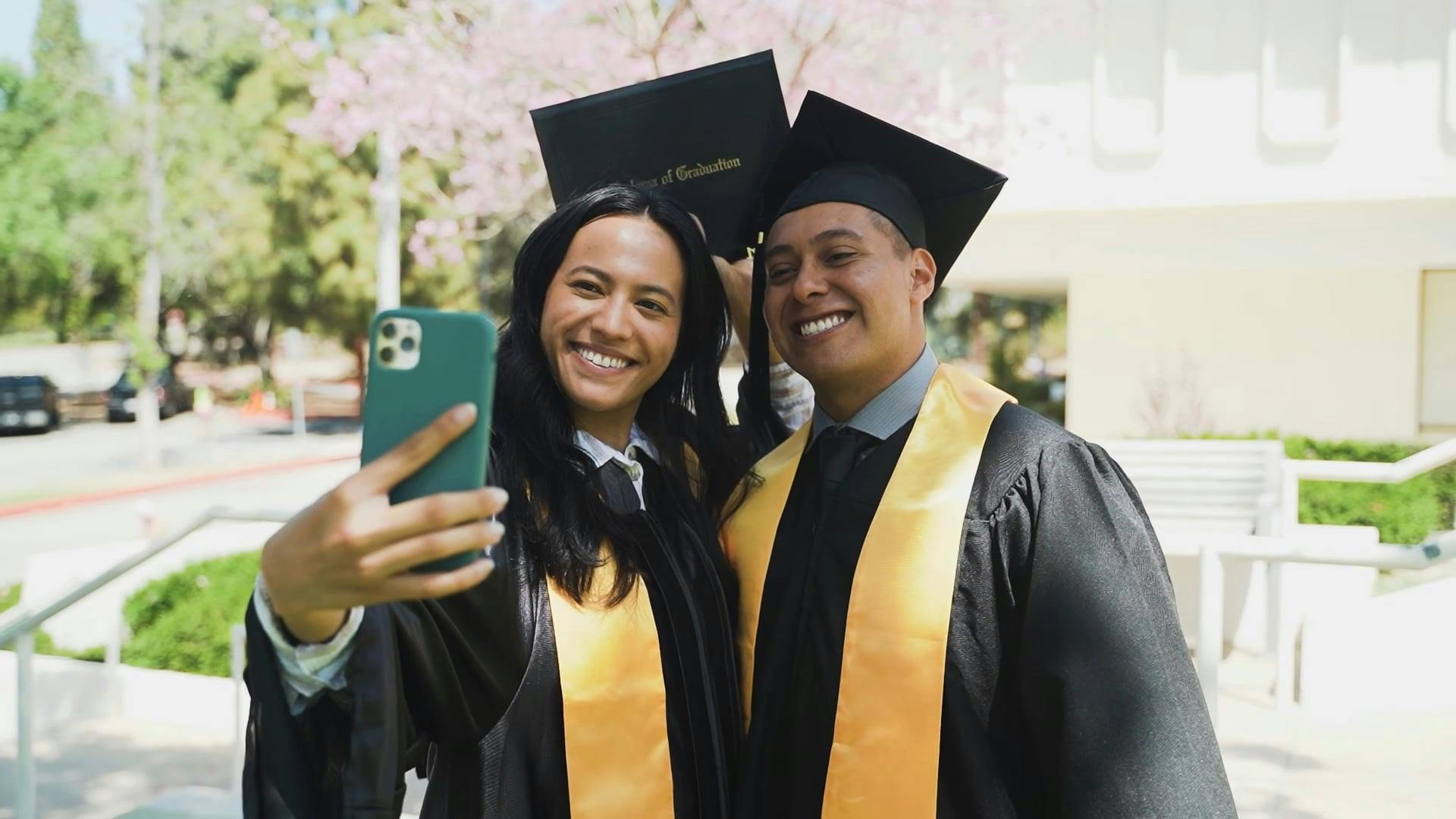 Man and Woman Taking Picture on Graduation Day · Free Stock Video