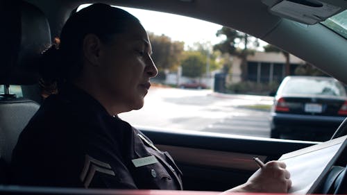 Police Officer Writing a Ticket