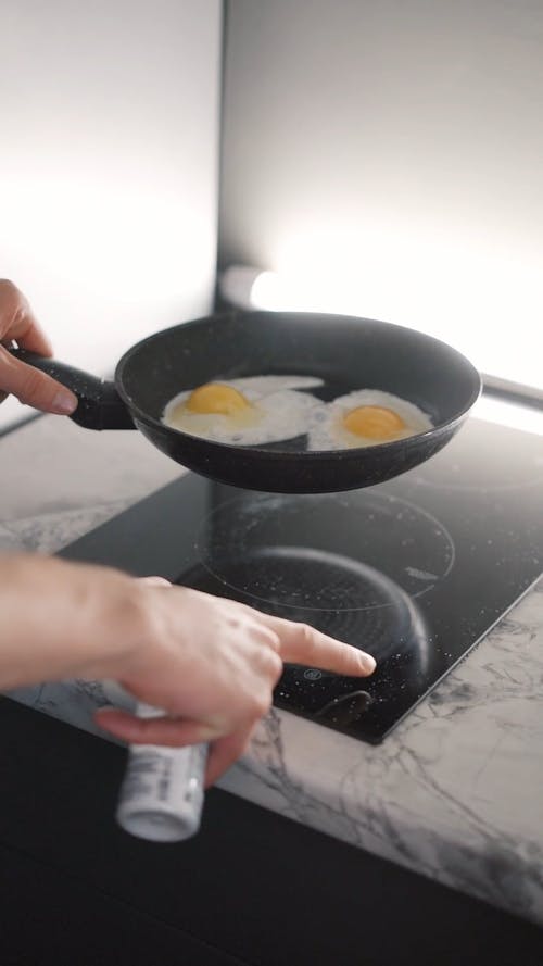 A Person Cooking Eggs
