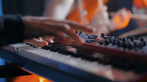 Close-Up Video of a Person Playing an Electronic Keyboard