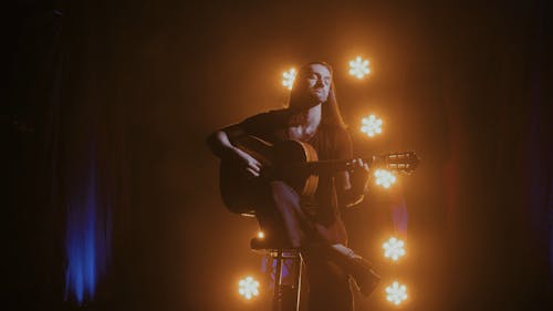 Man Playing Guitar