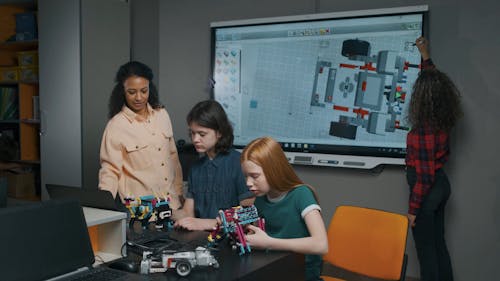 Young Engineers Developing Robots