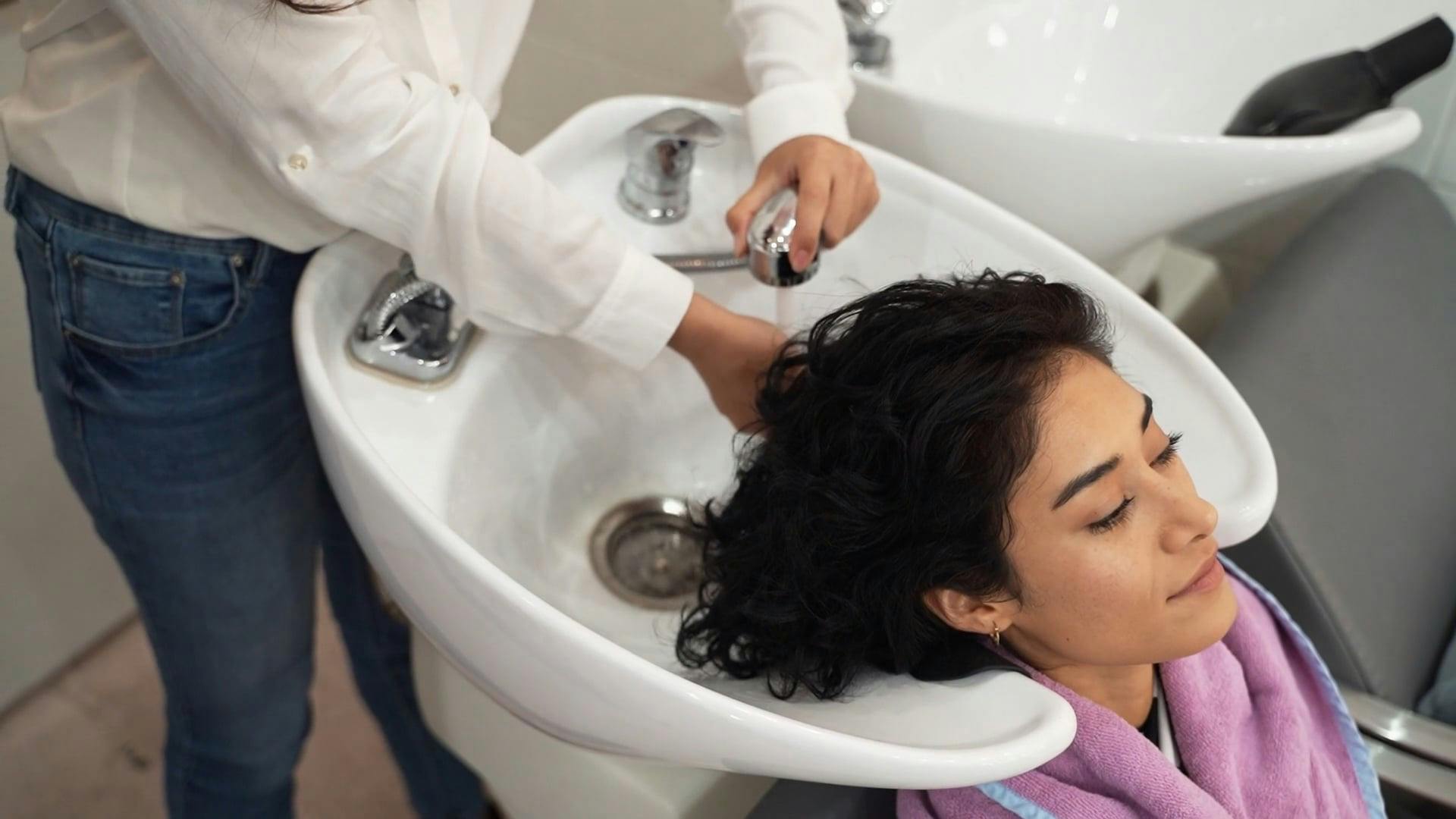 Woman Getting Hair Washed at a Salon · Free Stock Video