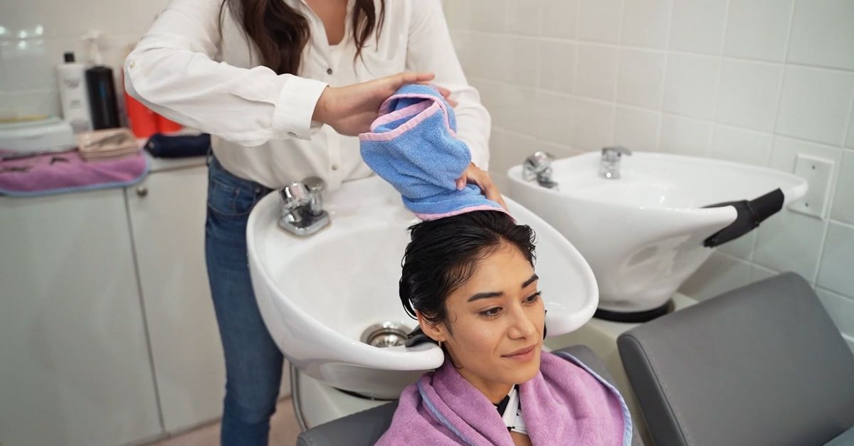 Client Twisting Hairdresser Twisting a Towel on a Client's Wet Hair Free Stock Video ...