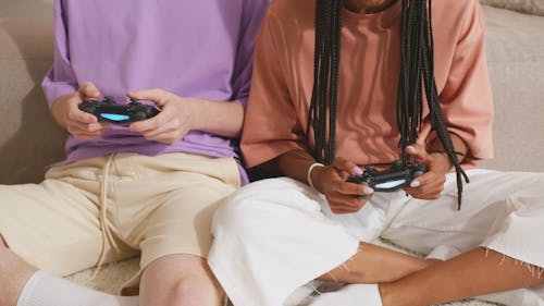 Man and Woman Playing Video Games