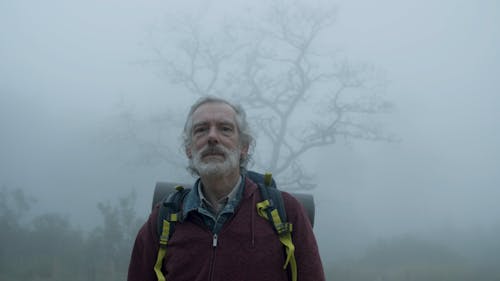 Senior Backpacker in the Mist