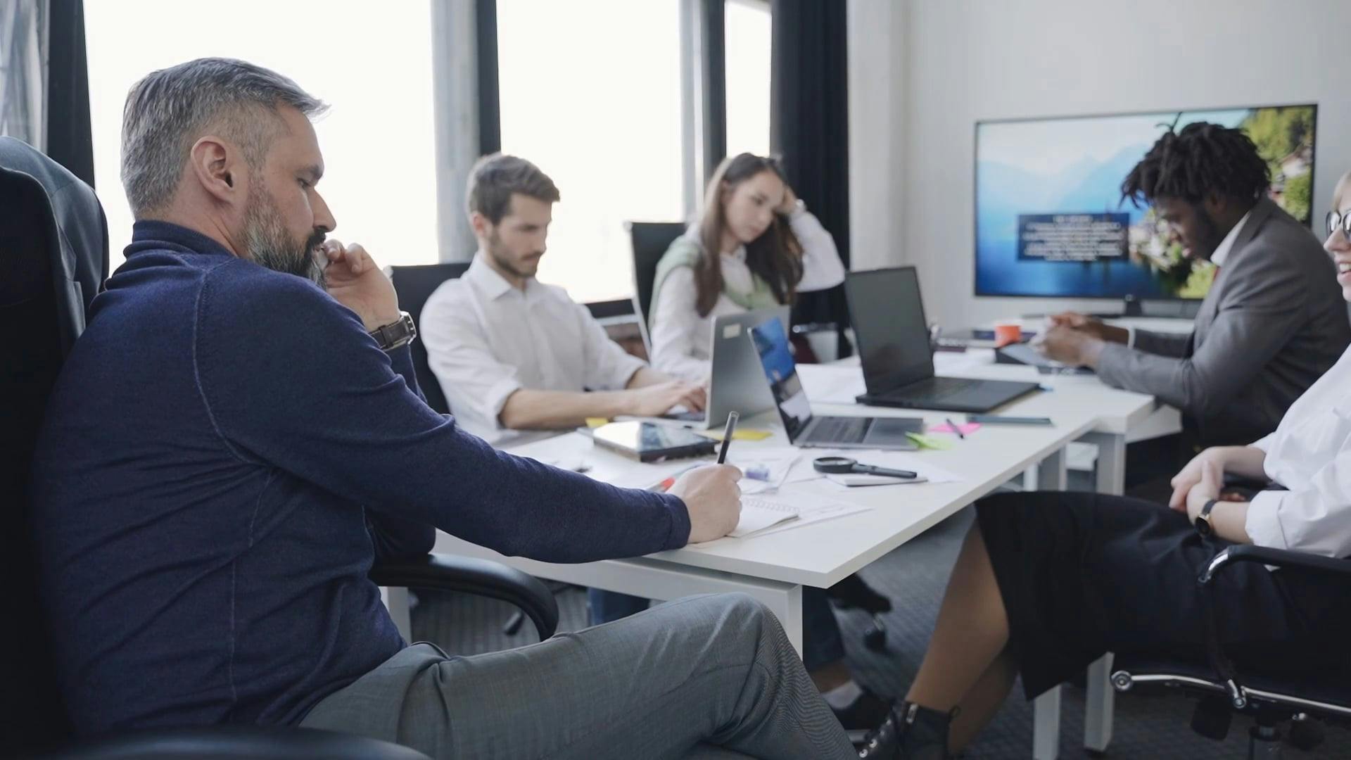 Man Talking on the Phone while in a Meeting · Free Stock Video