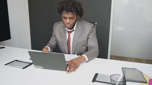 A Man Working In An Office