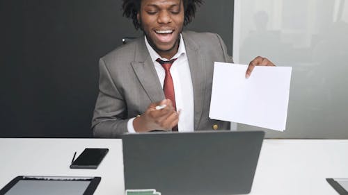 Man Talking using Laptop