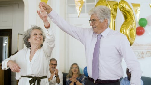 A Senior Couple Dancing Together