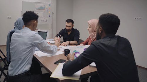 Coworkers Discussing in the Meeting Room