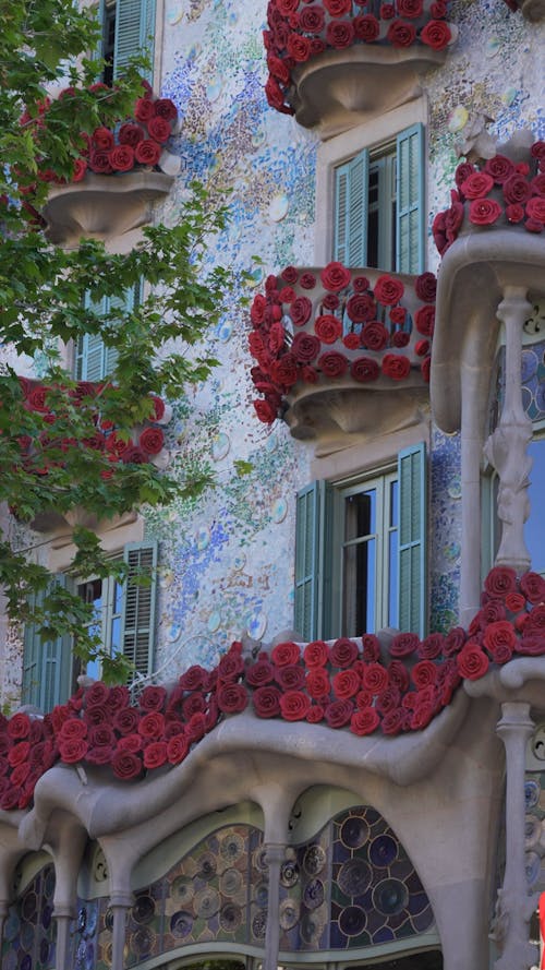 House Exterior Decorated With Flowers