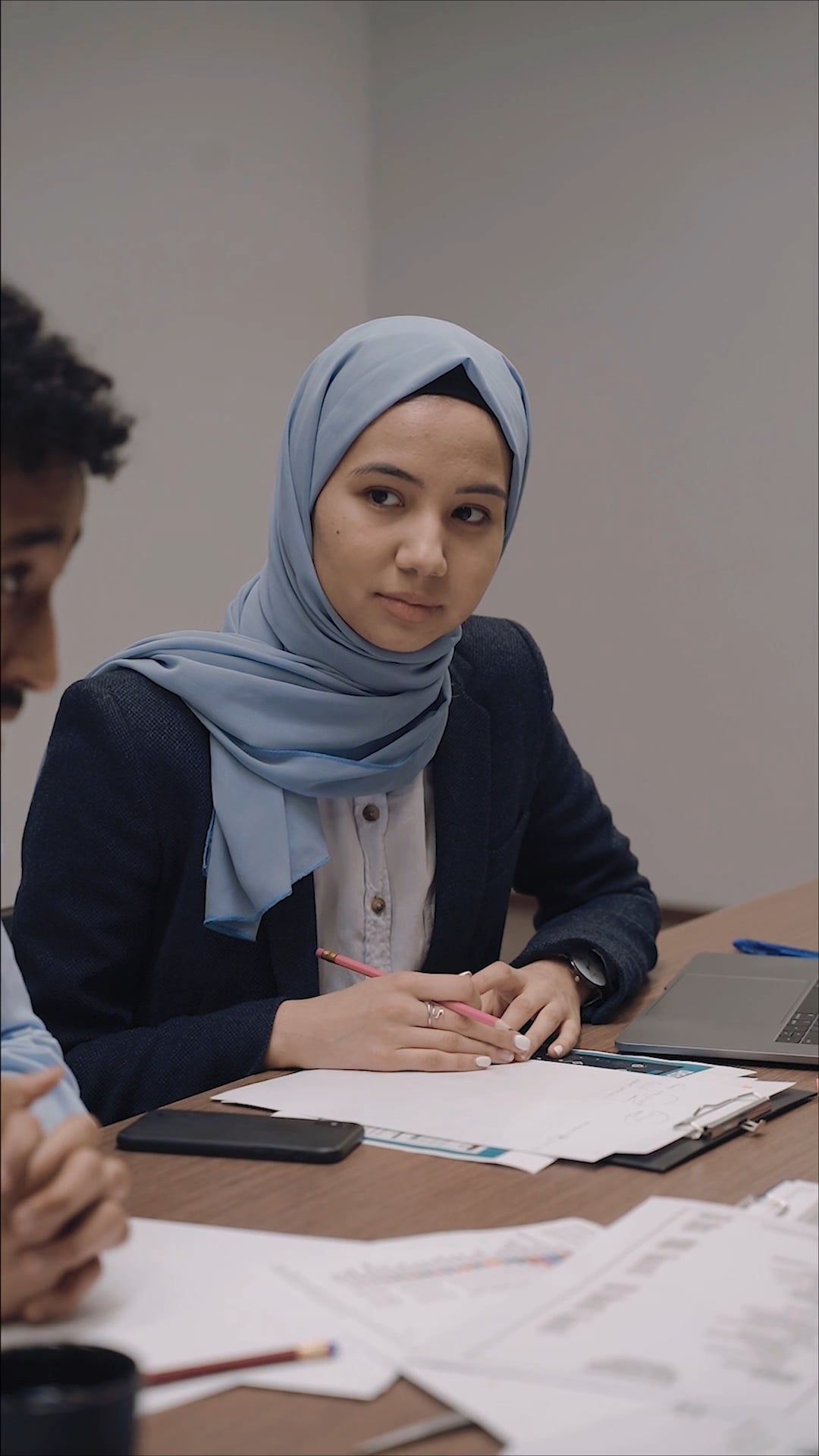 Woman Wearing Hijab at a Meeting · Free Stock Video