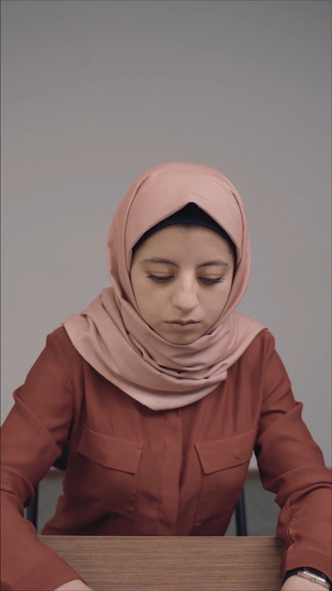 Woman Wearing Hijab Using a Laptop · Free Stock Video