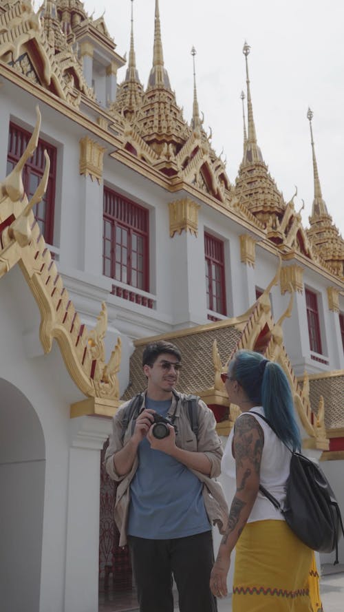 Man and Woman Having a Conversation Outdoors