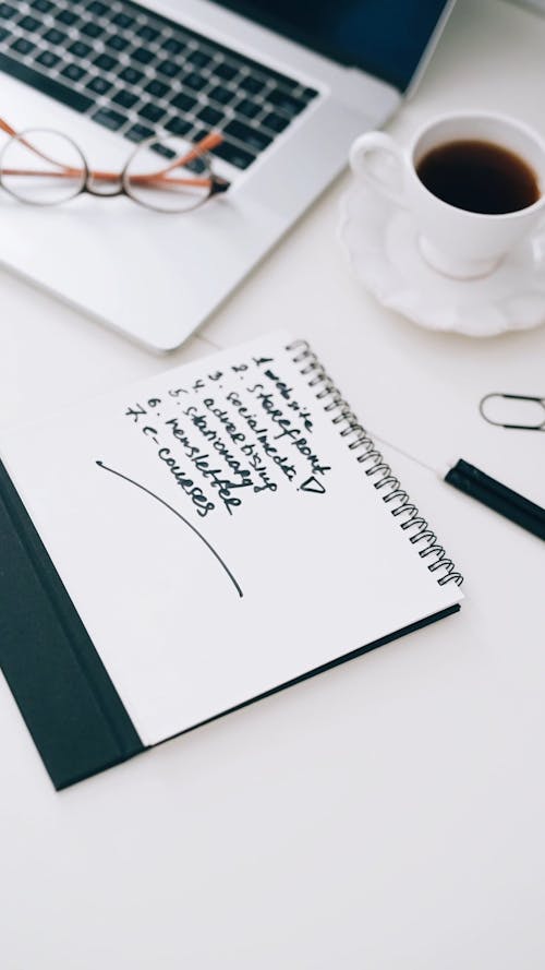 Business Plan Written on a Notepad