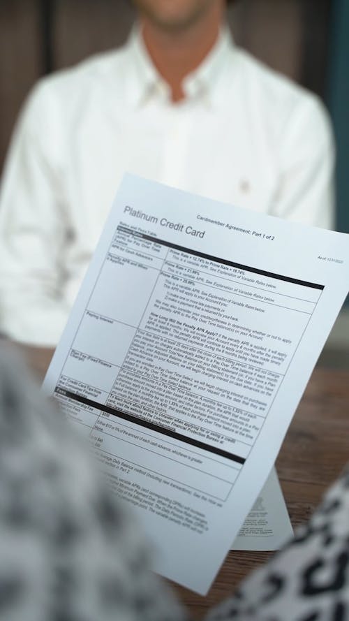 Person at Office Holding a Document