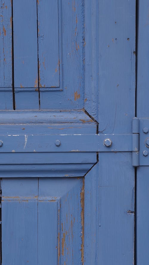 Tracking Shot of a Blue Door