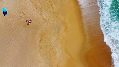 high angle shot of the people at the beach