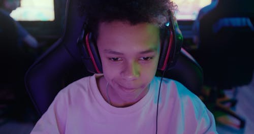 A Boy Gaming on the Computer