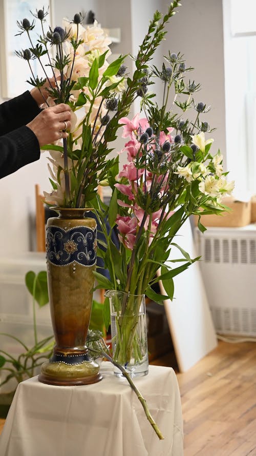 Person Arranging Flower Bouquet