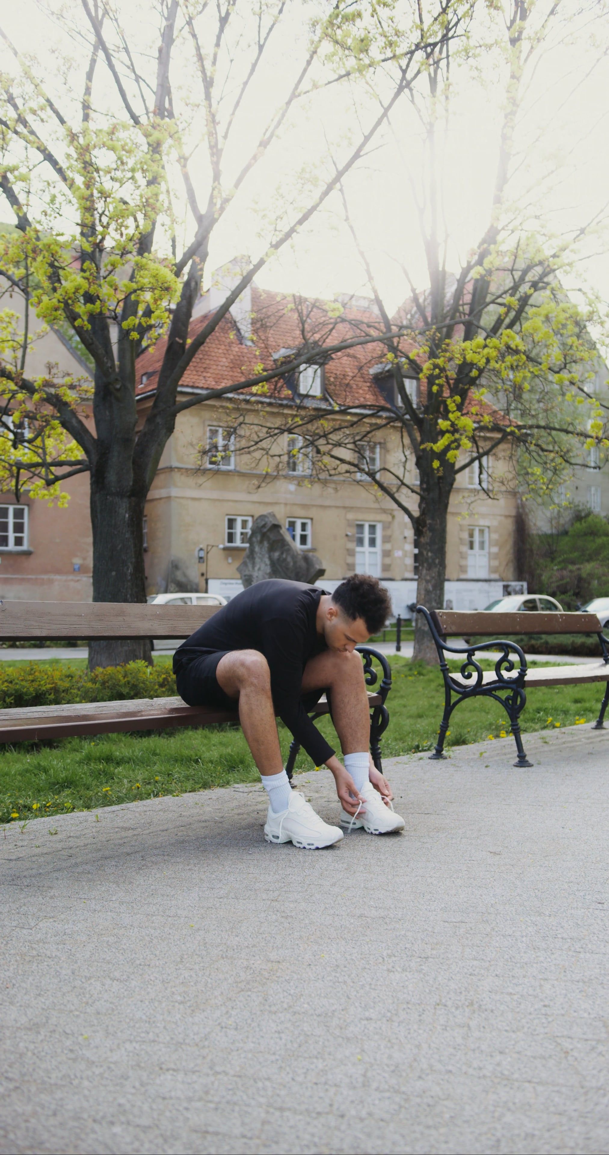 A Man Tying The Laces Of His Rubber Shoes Then Running Free Stock Video