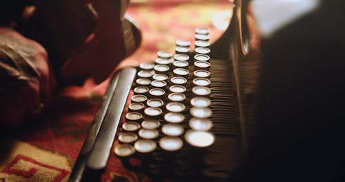 Person using Typewriter