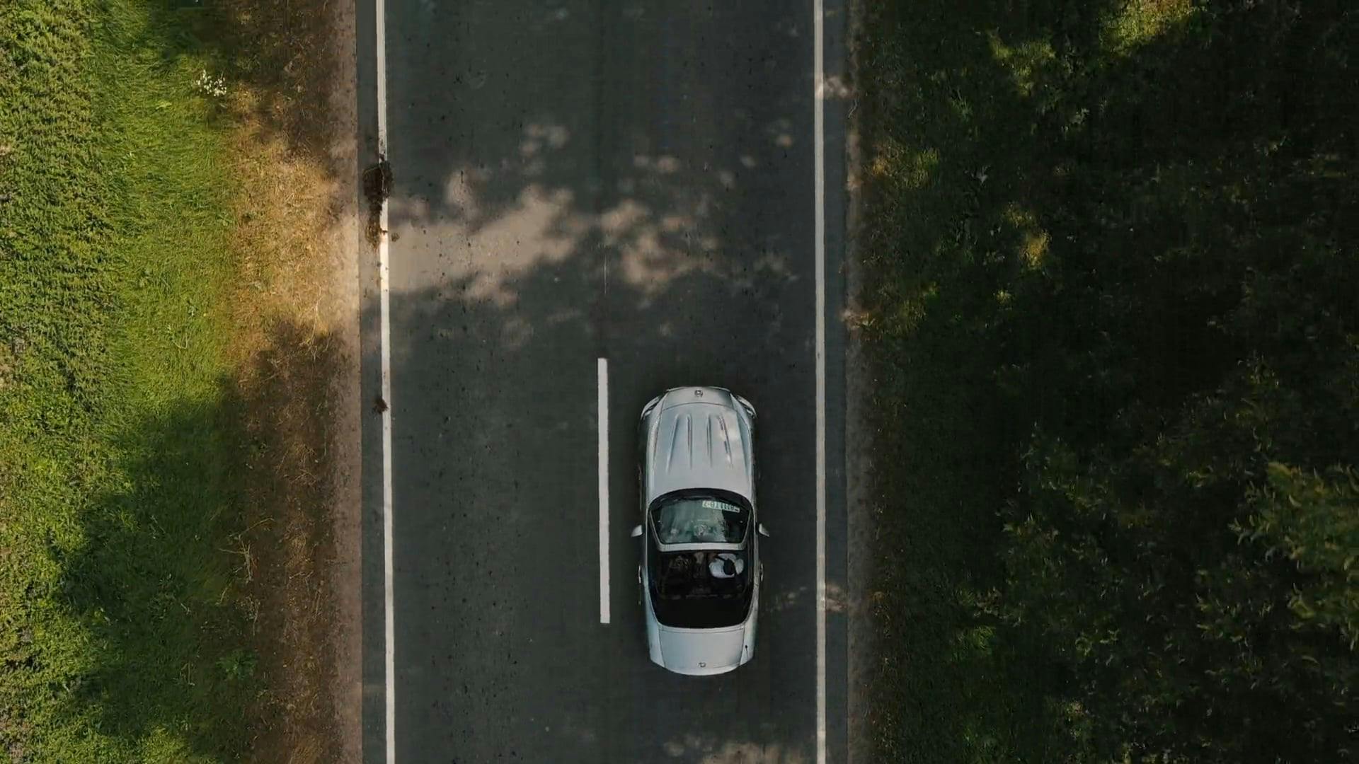 Aerial View of a Car Moving Fast in the Road · Free Stock Video