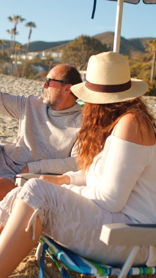 Couple  Having Fun In The Beach