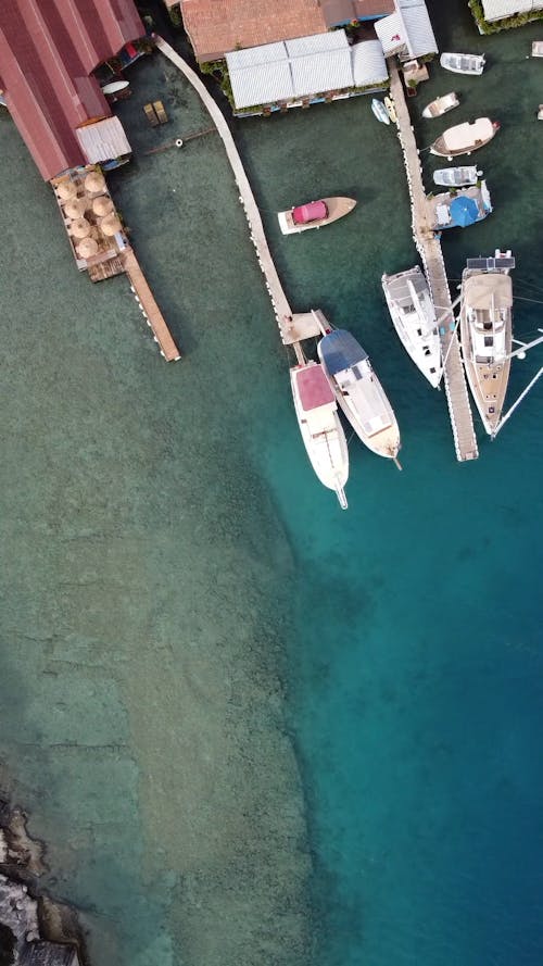 Aerial View of the Beach with Boats Socked on the Shore