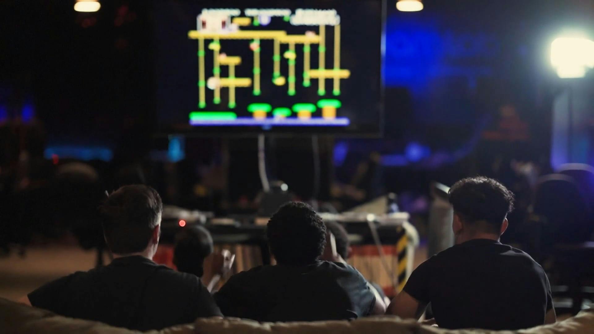 A Team Of Gamers Inside An Arcade \u00b7 Free Stock Video